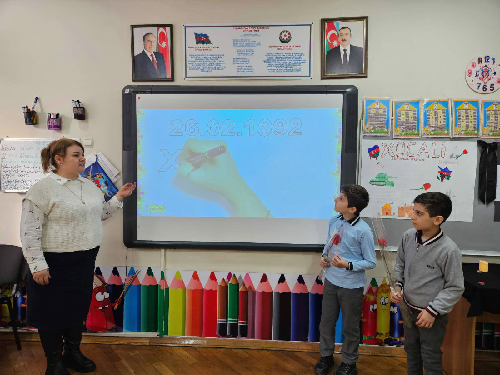 Təhsil müəssisələrində Xocalı qurbanları yad edilib